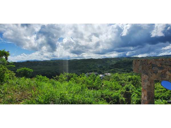 Land With Mountain And Sea View